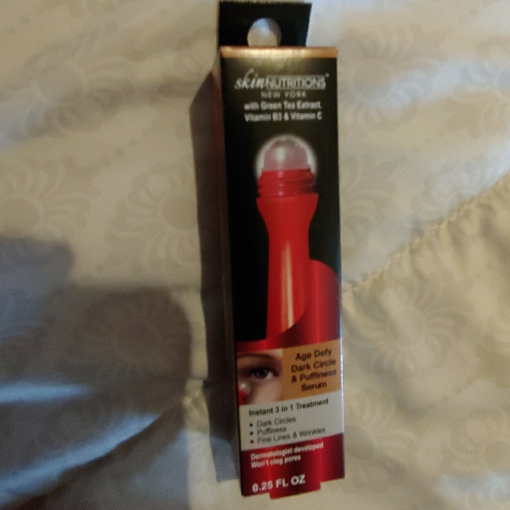 Age defy and dark circle and puffiness serum